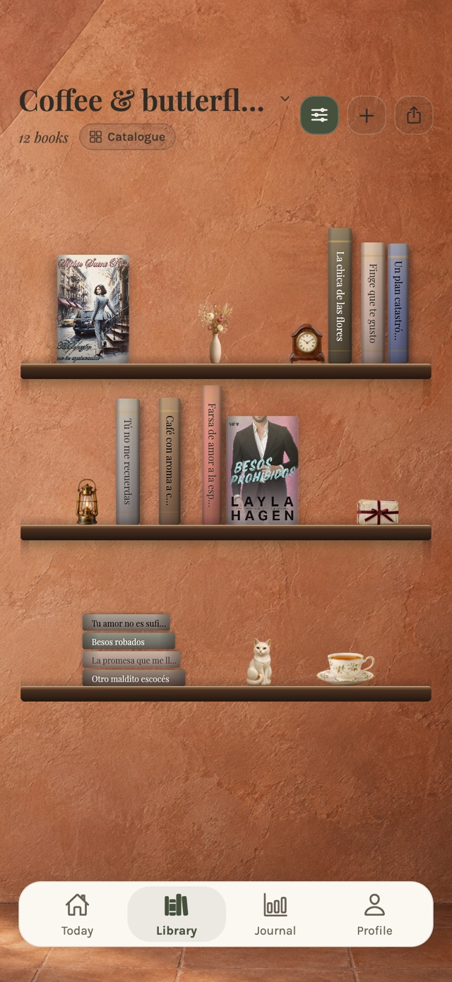 Coffee & butterflies: a clay-toned bookshelf with books, flowers and a teacup in myShelf